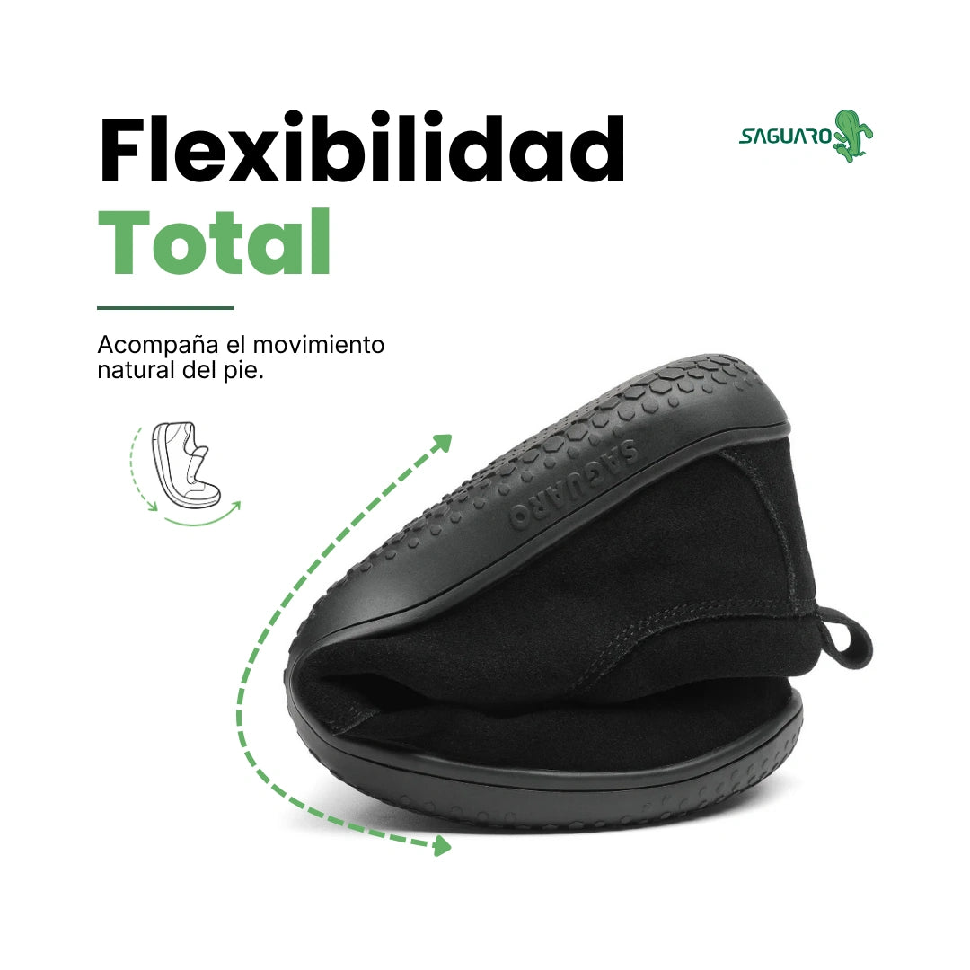 Dream I negro doblado demostrando flexibilidad barefoot ligera.