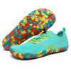 Zapatillas Smart II turquesa mostrando suela y lateral combinadas.
