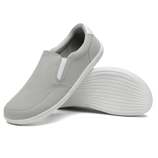 Suela plana gris/blanca para caminar natural y postura correcta.