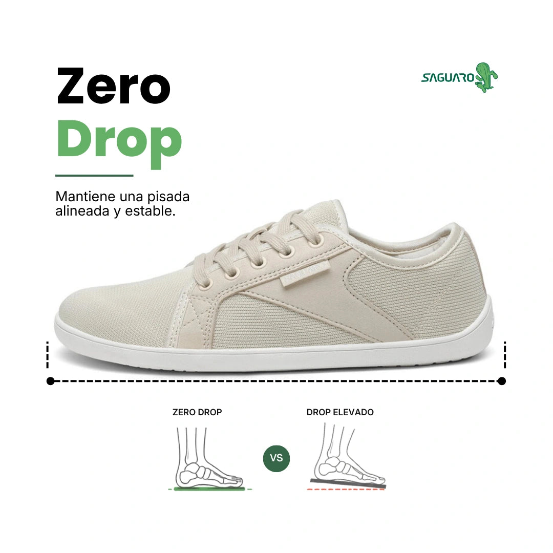 Vista superior calzado minimalista crema, amplio espacio para dedos.