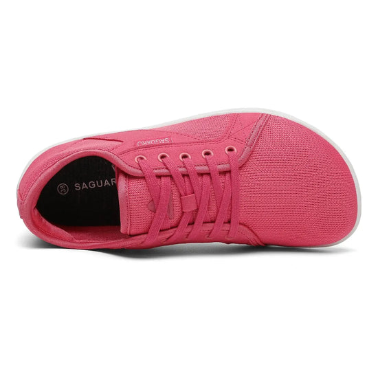 Vista superior calzado minimalista fucsia, amplio espacio para dedos.