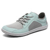 Zapatilla minimalista Wish II menta, tejido gris, puntera ancha y zero drop.