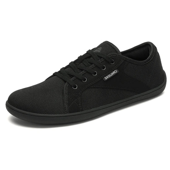 Zapatilla minimalista Saguaro negra, puntera ancha y zero drop.