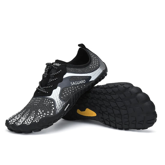 Zapatillas para gimnasio y crossfit barefoot Saguaro Fast I, máxima estabilidad y conexión con el suelo en color negro uniforme.