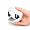 Zapatilla minimalista para colegio ZZFABER Kids Niza I blanca doblada por completo, mostrando su suela elástica y flexible de caucho en Chile.