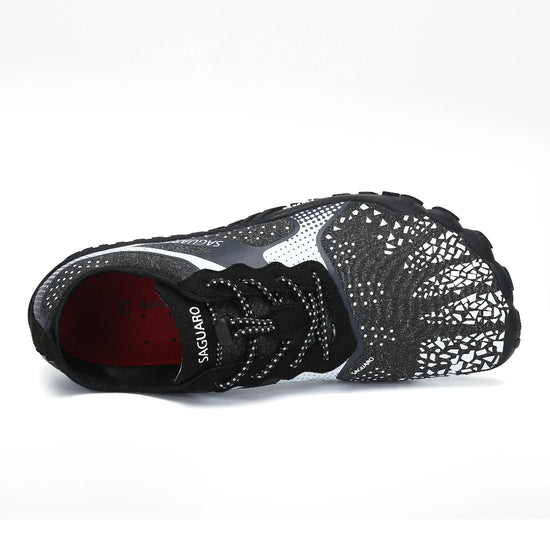 Zapatillas minimalistas negras Saguaro Fast I, calzado con drop cero y suela flexible para entrenamiento funcional en Chile.