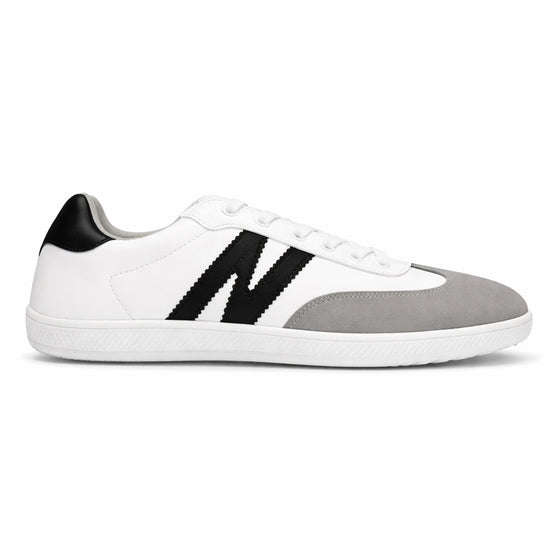 Zapatilla barefoot ZZfaber Niza I blanco con negro vista lateral.