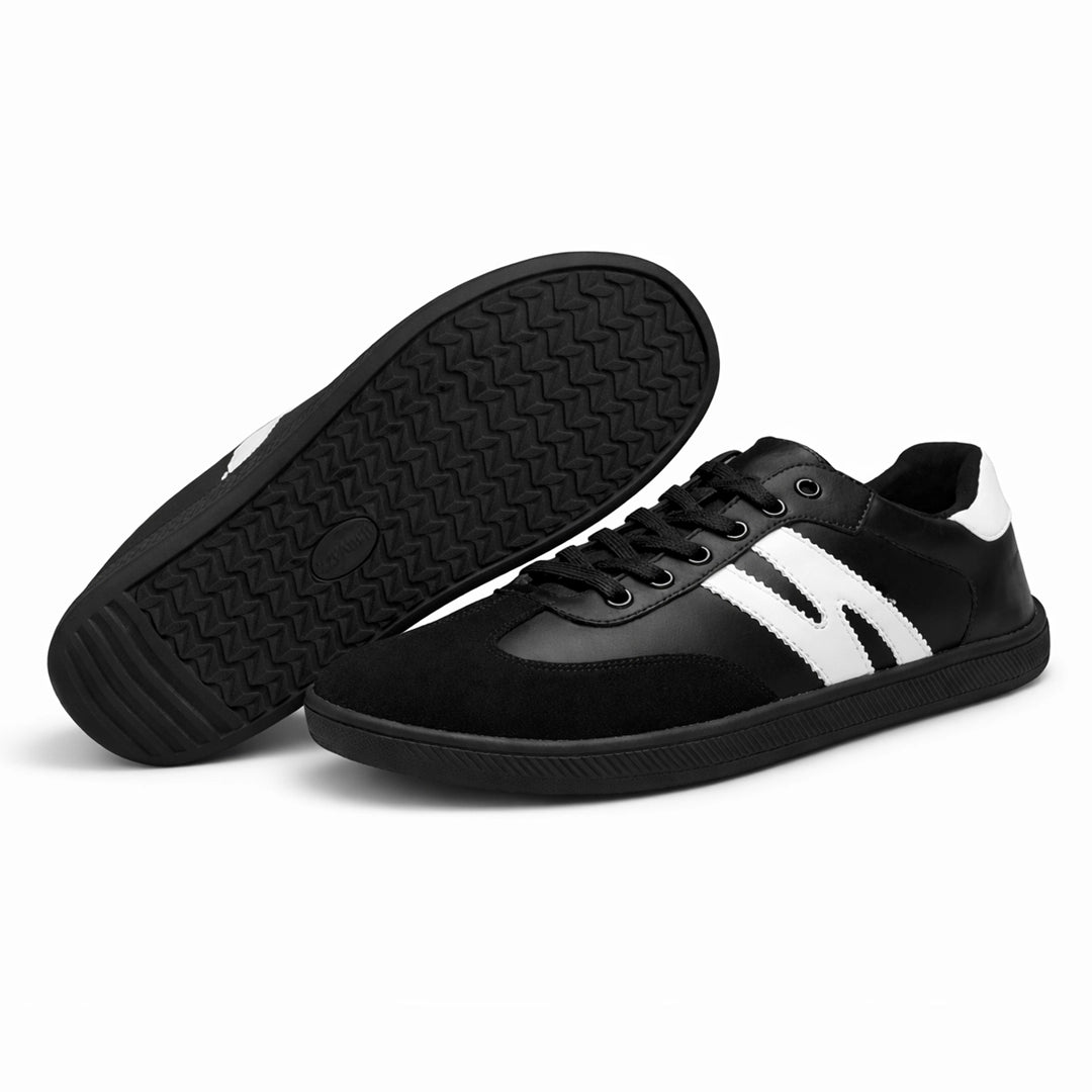 Suela flexible y antideslizante de la zapatilla barefoot ZZfaber Niza I negra con blanco.